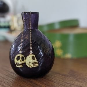 Dangly skull earrings